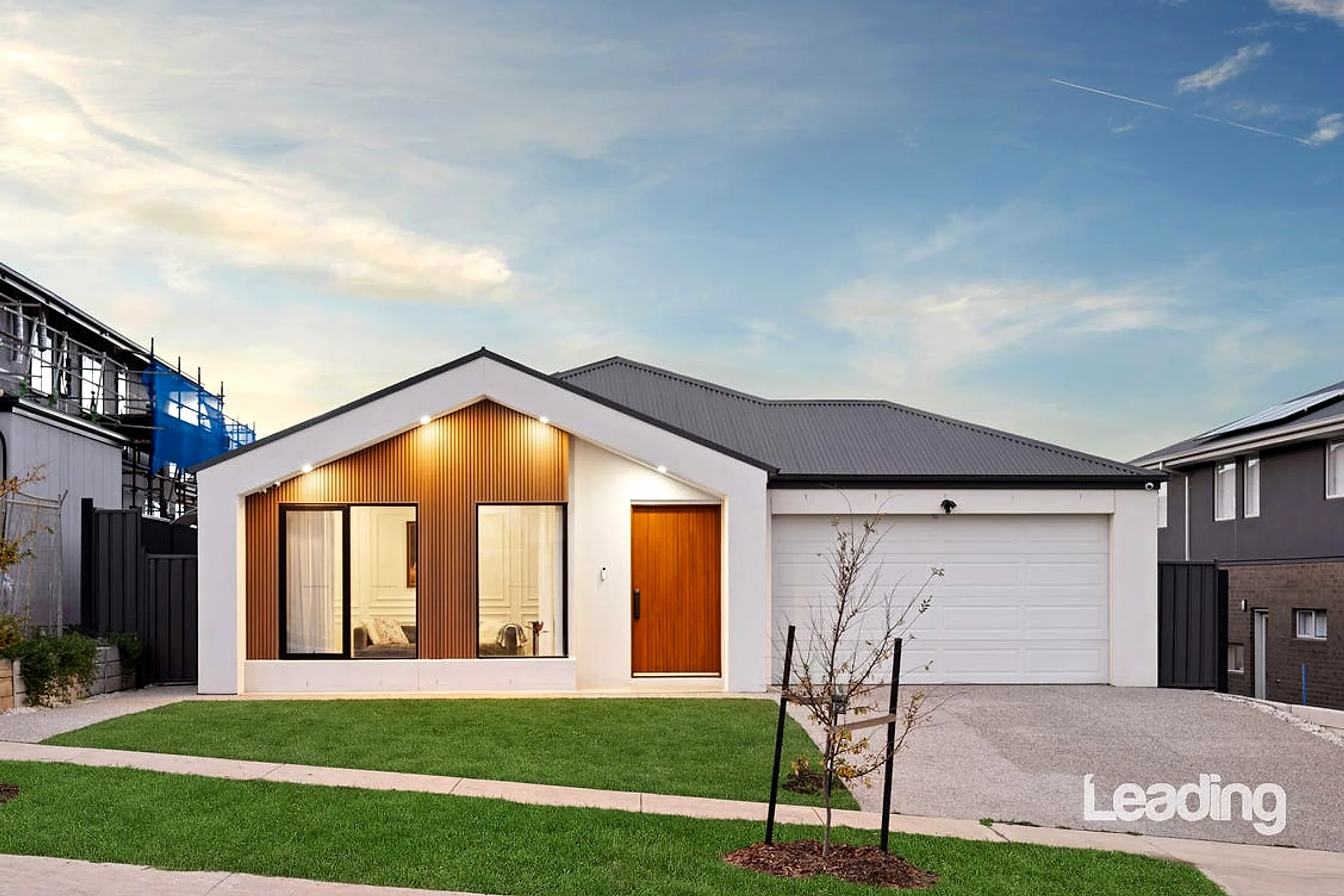 Contemporary rendered façade of 122 Elizabeth Drive at street level